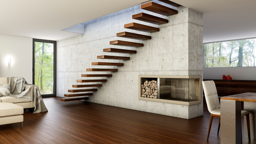 На фото: большая прямая лестница в современном стиле с деревянными ступенями с