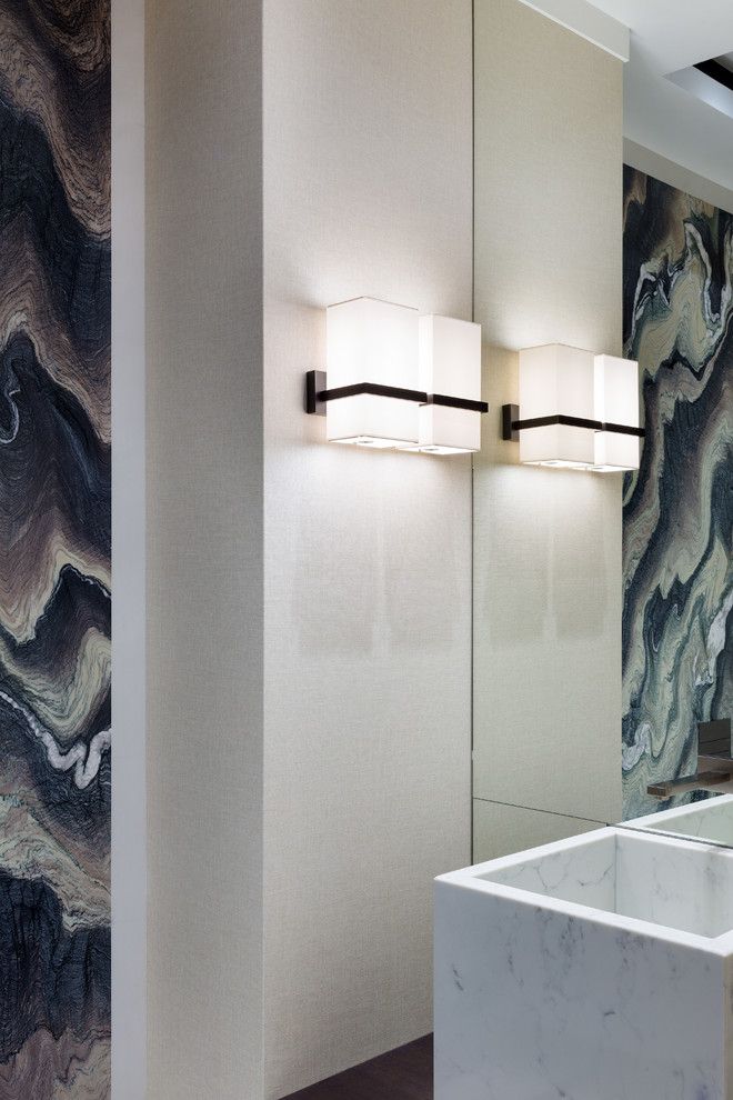 Photo of a small contemporary cloakroom in Moscow with stone tiles.
