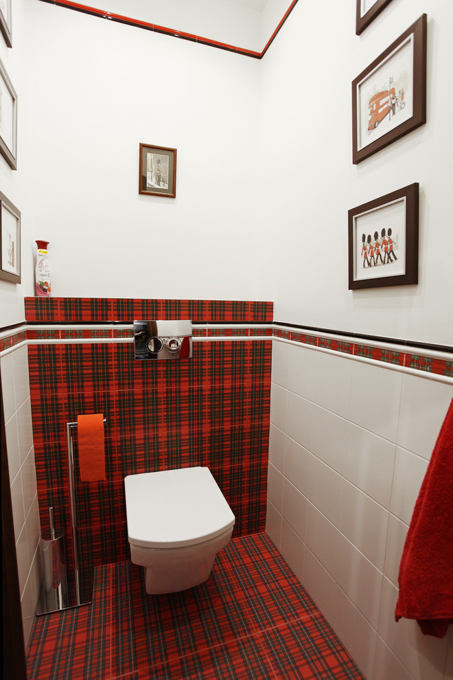 На фото: туалет в современном стиле с инсталляцией, белой плиткой, красной плиткой и разноцветной плиткой с