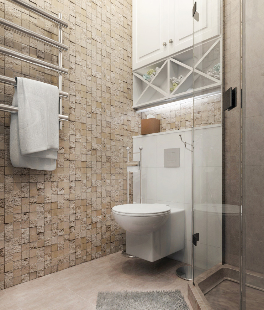 Immagine di un piccolo bagno di servizio design con WC sospeso, piastrelle beige, lastra di pietra, pareti beige, pavimento in gres porcellanato e pavimento beige