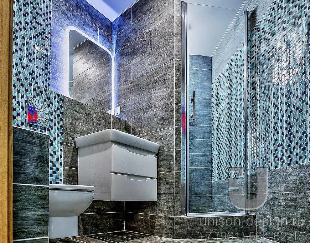 Idéer för ett litet minimalistiskt badrum, med släta luckor, vita skåp, en vägghängd toalettstol, grå kakel, mosaik, grå väggar, klinkergolv i porslin, ett väggmonterat handfat och grått golv
