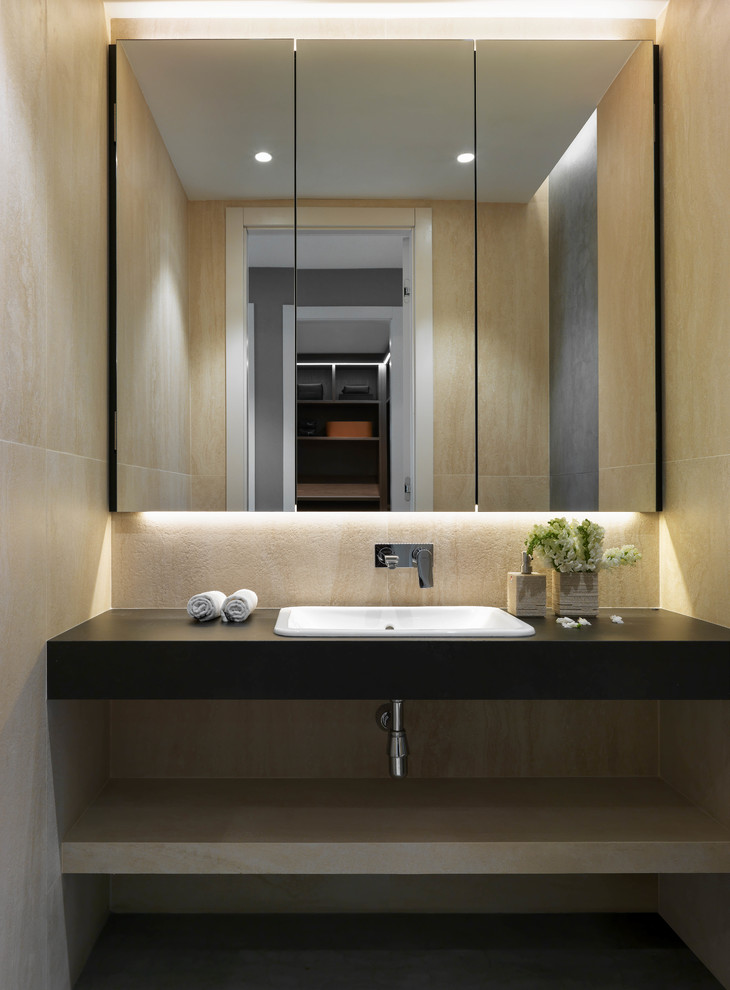 Идея дизайна: туалет среднего размера в современном стиле с инсталляцией, бежевой плиткой, керамогранитной плиткой, бежевыми стенами, полом из керамогранита, врезной раковиной, столешницей из плитки, серым полом и серой столешницей