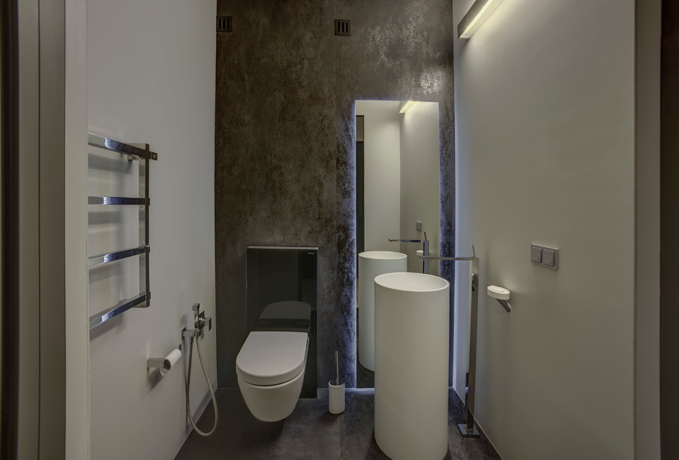 Foto de aseo contemporáneo pequeño con sanitario de pared, baldosas y/o azulejos de porcelana y suelo de baldosas de porcelana
