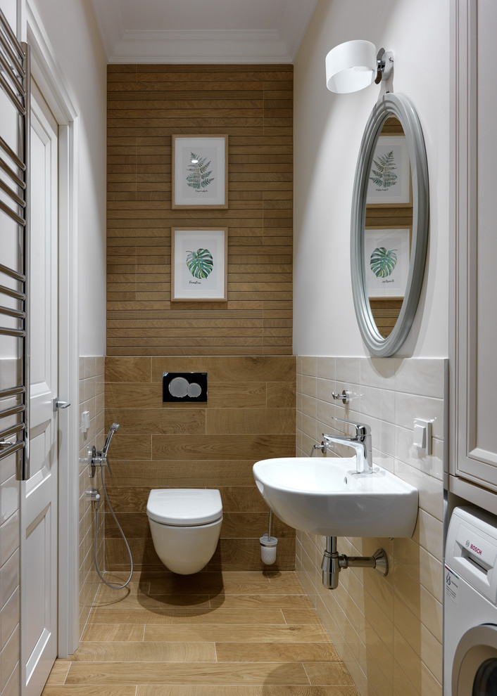 Inspiration för små moderna toaletter, med en vägghängd toalettstol, porslinskakel, klinkergolv i porslin och ett väggmonterat handfat