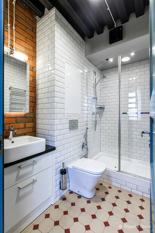 Inspiration for an industrial powder room remodel in Moscow