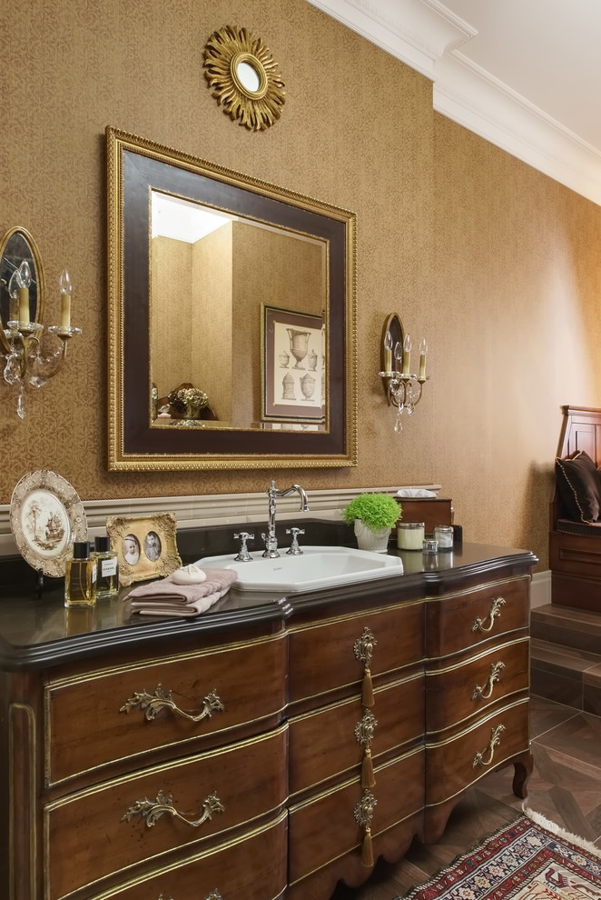 Design ideas for a large victorian cloakroom in Other with raised-panel cabinets, white cabinets, a one-piece toilet, beige tiles, ceramic tiles, white walls, ceramic flooring, a console sink, marble worktops, brown floors and white worktops.
