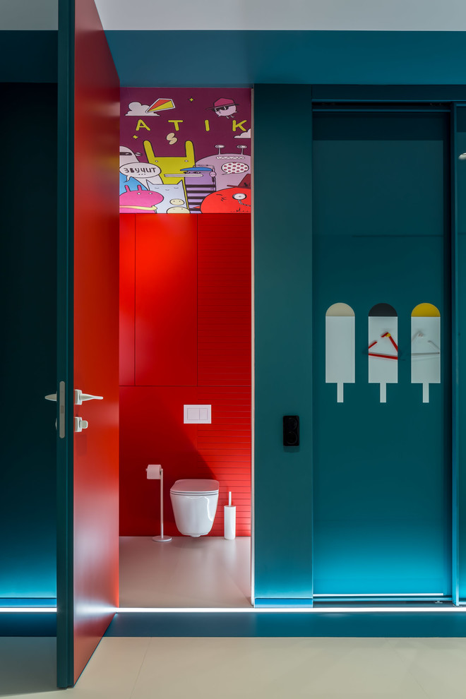 Esempio di un piccolo bagno di servizio contemporaneo con ante lisce, ante rosse, WC sospeso, piastrelle rosse, piastrelle in ceramica, pareti rosse, lavabo sospeso e pavimento bianco