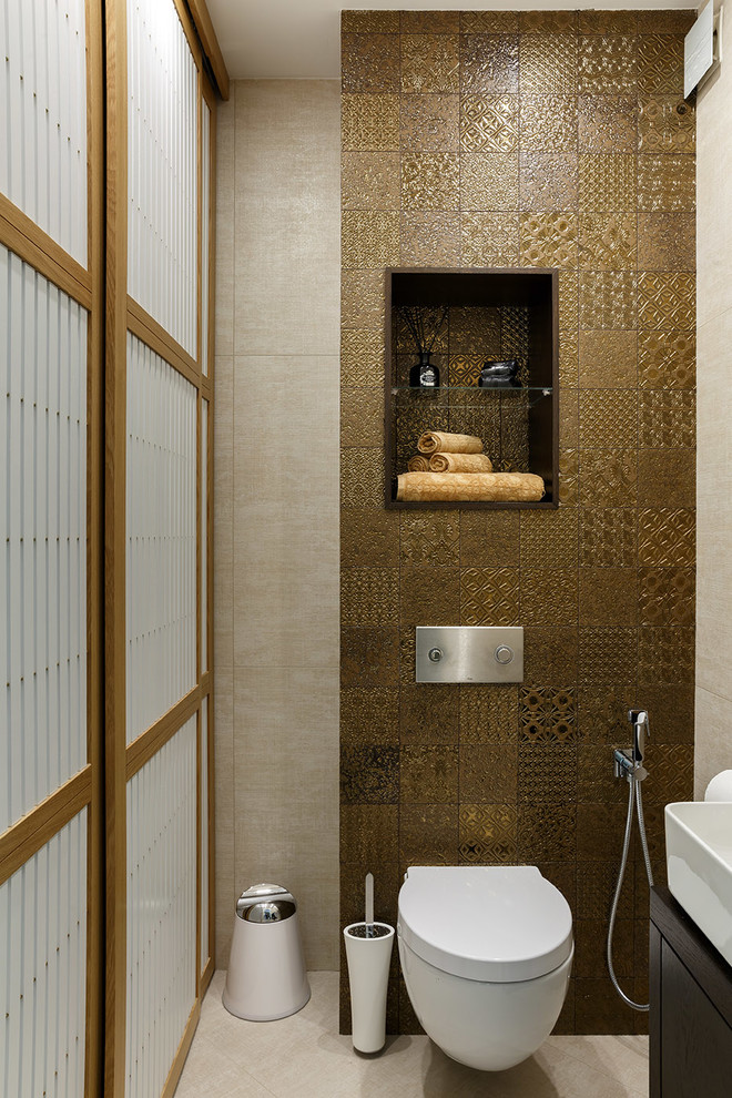 Example of a small trendy brown tile and porcelain tile powder room design in Saint Petersburg with a wall-mount toilet