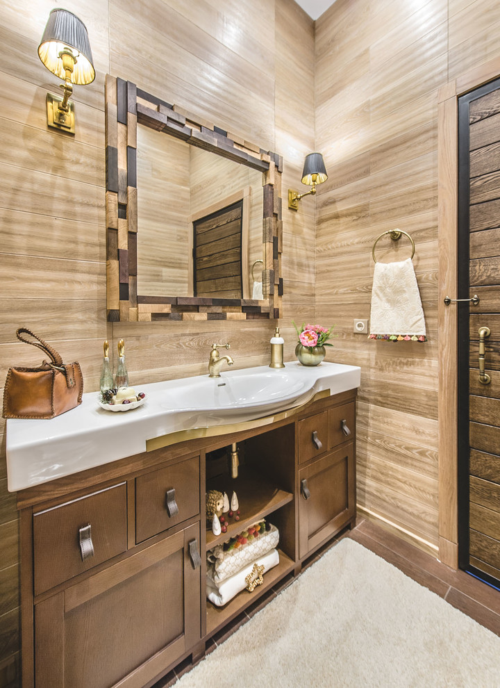 Example of a mid-sized cottage porcelain tile powder room design in Moscow with brown cabinets, beige walls, a drop-in sink and recessed-panel cabinets
