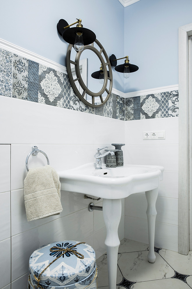 Inspiration for a large traditional cloakroom in Moscow with white tiles, grey tiles, blue walls, a console sink, a wall mounted toilet, matchstick tiles, porcelain flooring, white floors and white worktops.
