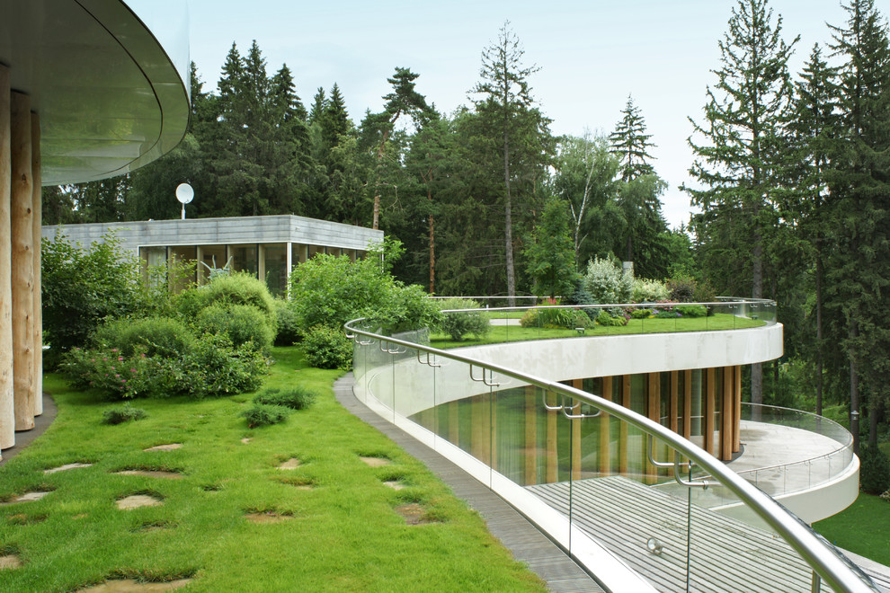 Esempio di un grande giardino minimal sul tetto in estate
