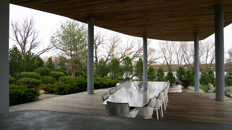 Foto di un ampio giardino minimalista esposto in pieno sole in autunno