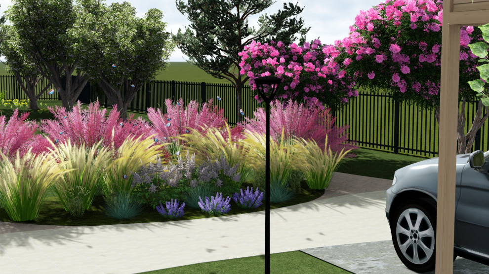 Exemple d'un jardin de taille moyenne et l'été avec un massif de fleurs, une exposition ensoleillée et des pavés en béton.