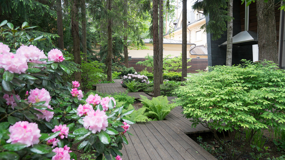 Idee per un giardino formale design con pedane e un ingresso o sentiero