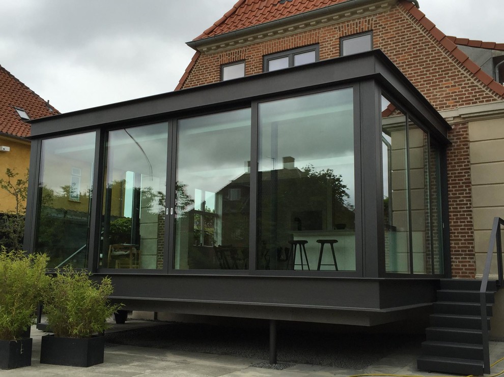 This is an example of a scandi conservatory in Copenhagen.