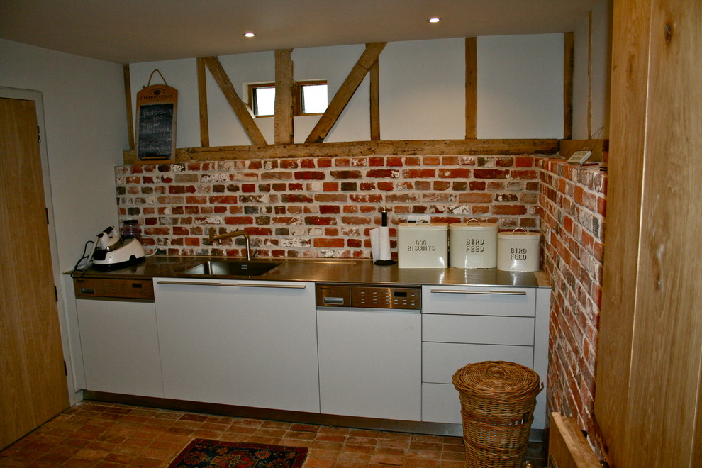 Design ideas for a small rustic utility room in Hampshire.