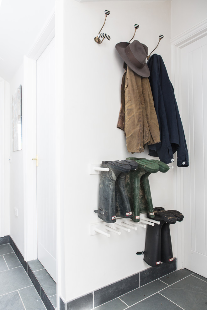 Photo of a beach style utility room in London.