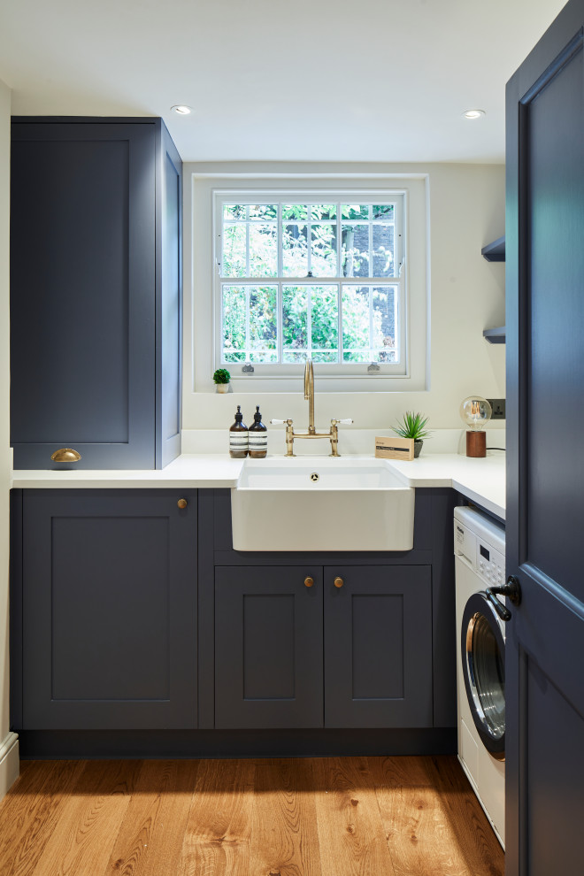 Inspiration for a timeless laundry room remodel in London