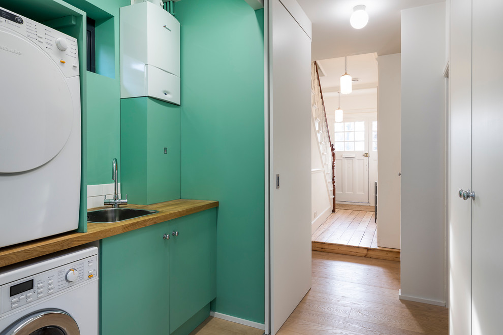 This is an example of a contemporary utility room in London.