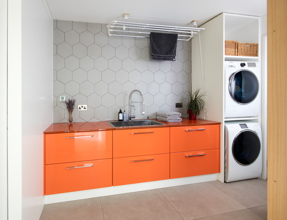 Inspiration for a modern laundry room remodel in London
