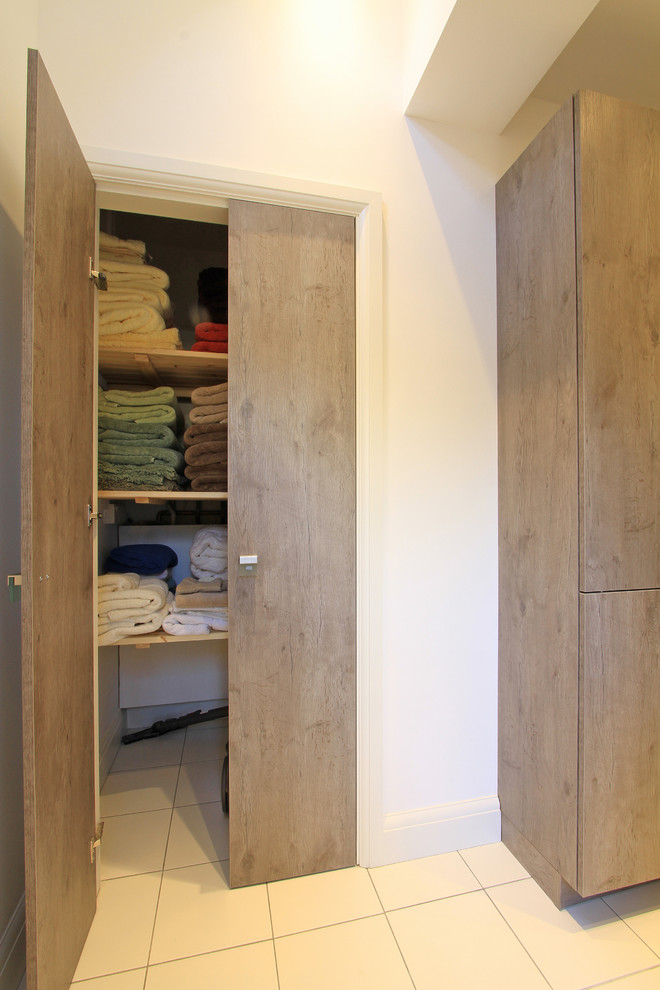 This is an example of a contemporary utility room in Hampshire.