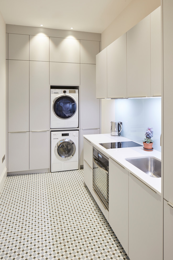 Large modern utility room with Contemporary Laundry Room London by Eclectic