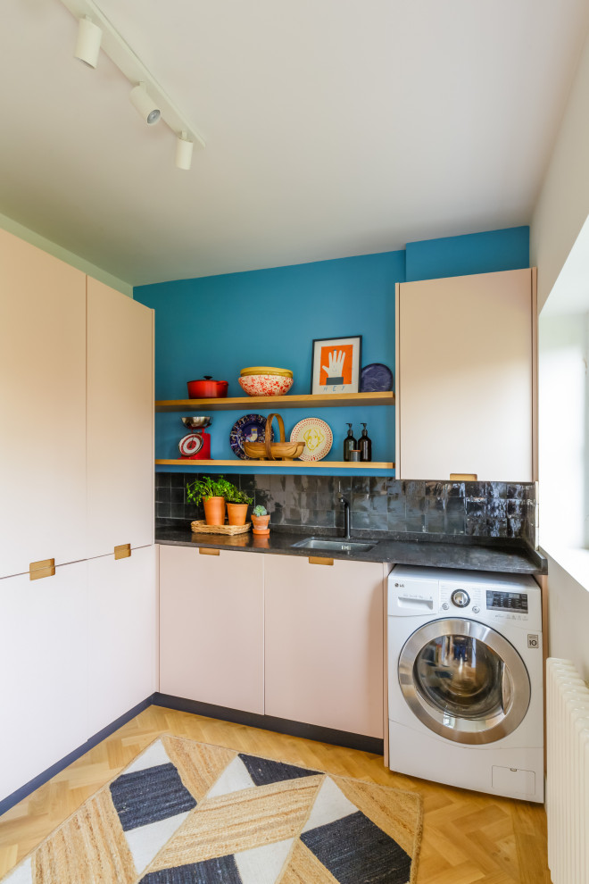 Photo of an eclectic utility room in Hertfordshire.