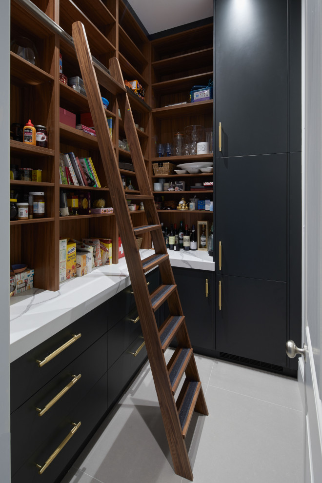 Example of a trendy laundry room design in London