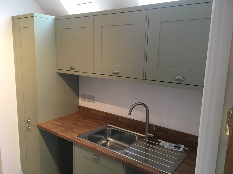 Example of a trendy laundry room design in Buckinghamshire
