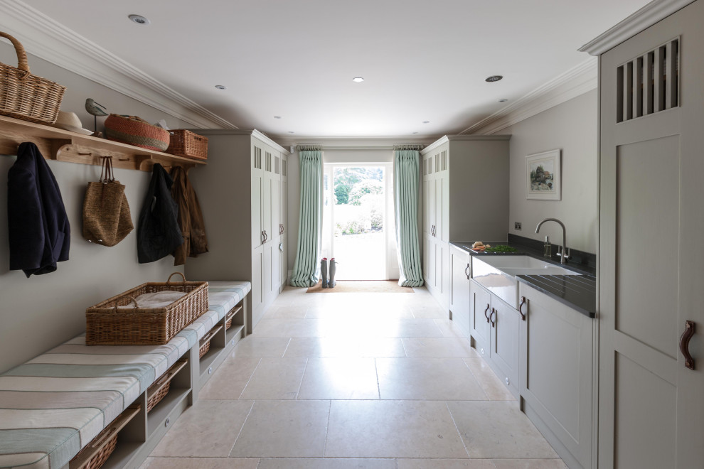 Example of a mid-sized laundry room design in London