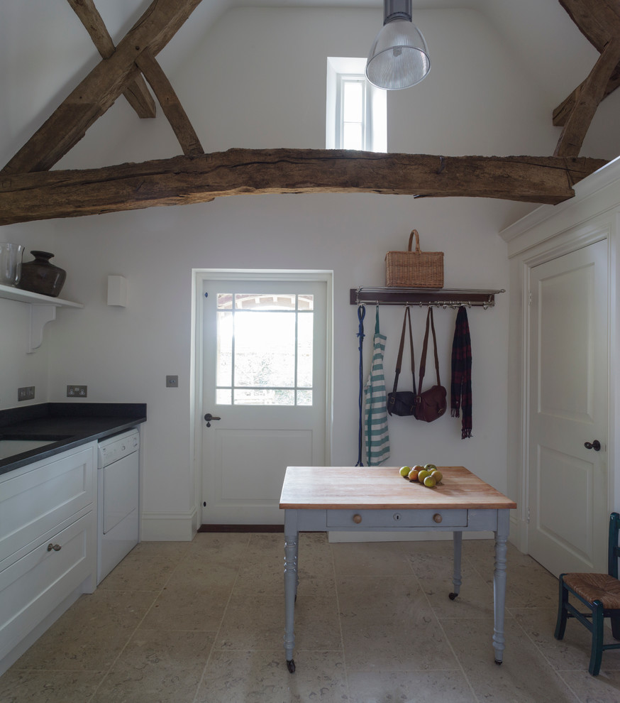 Example of a transitional laundry room design in Wiltshire