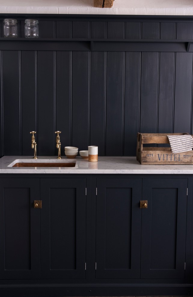 This is an example of a rustic utility room in Other.