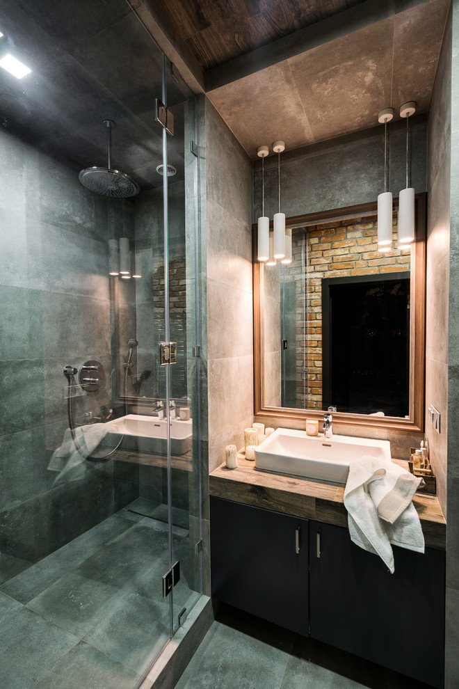 This is an example of a medium sized shower room bathroom in Other with porcelain tiles, porcelain flooring, tiled worktops, grey floors, a hinged door, an alcove shower, grey tiles and a vessel sink.