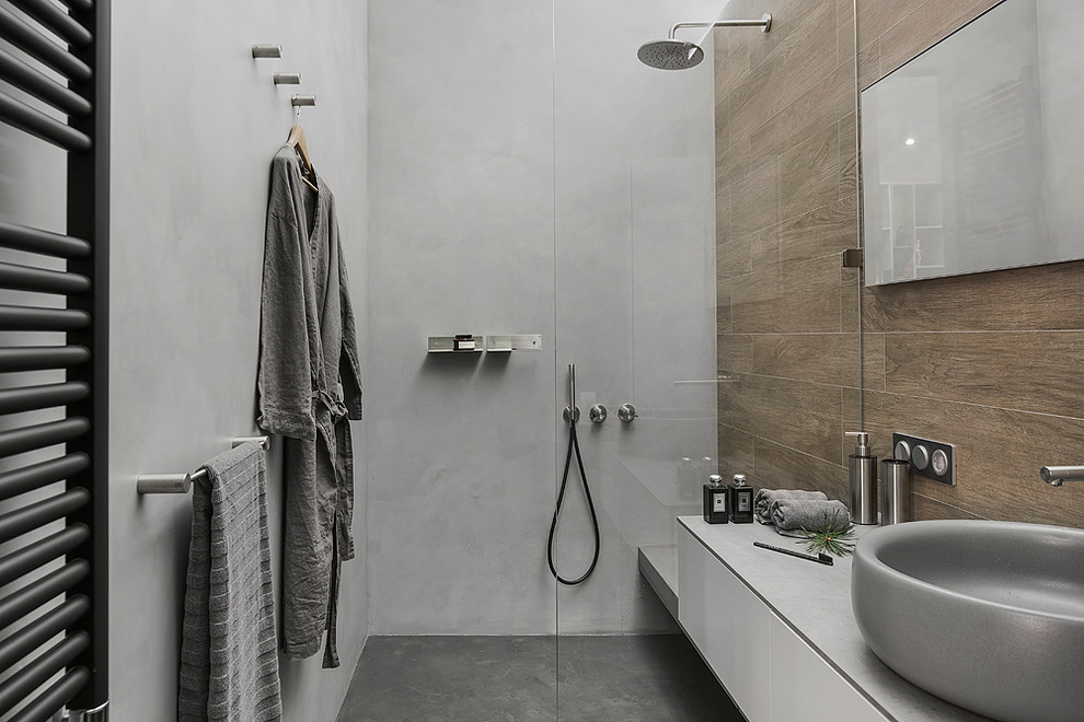 Inspiration for an industrial 3/4 brown tile bathroom remodel in Moscow with flat-panel cabinets, white cabinets, gray walls and a vessel sink