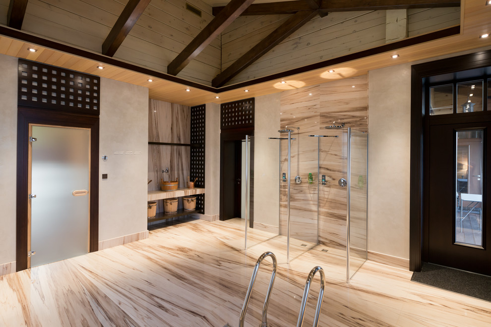 Идея дизайна: главная ванная комната в современном стиле с бежевыми фасадами, ванной в нише, двойным душем, унитазом-моноблоком, бежевой плиткой, керамогранитной плиткой, белыми стенами, мраморным полом, консольной раковиной и мраморной столешницей