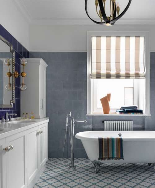 Custom-Made Elegance: Blue Backsplash and Vanity Unit in a Blue and White Bathroom