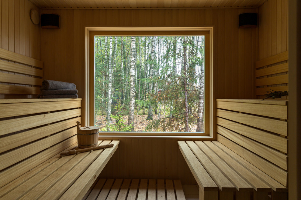 Cette photo montre un sauna tendance de taille moyenne.