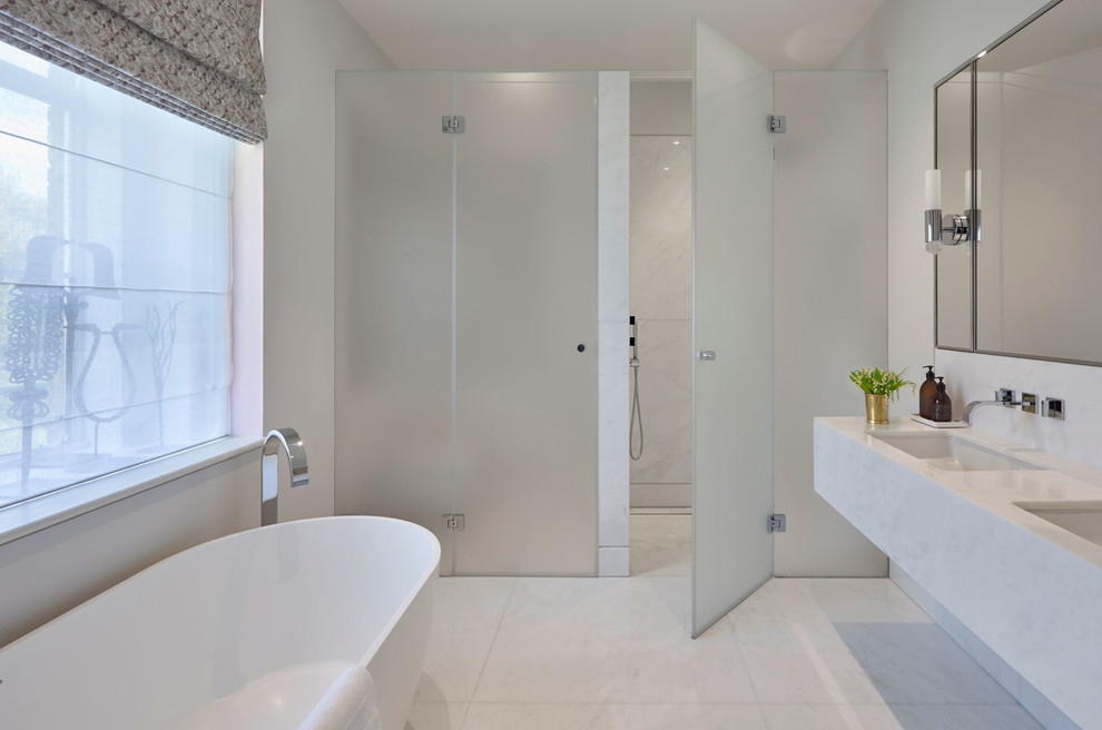 Inspiration for a medium sized contemporary ensuite bathroom in Moscow with a shower/bath combination, white tiles, porcelain tiles, porcelain flooring, solid surface worktops, a freestanding bath, white walls and a submerged sink.