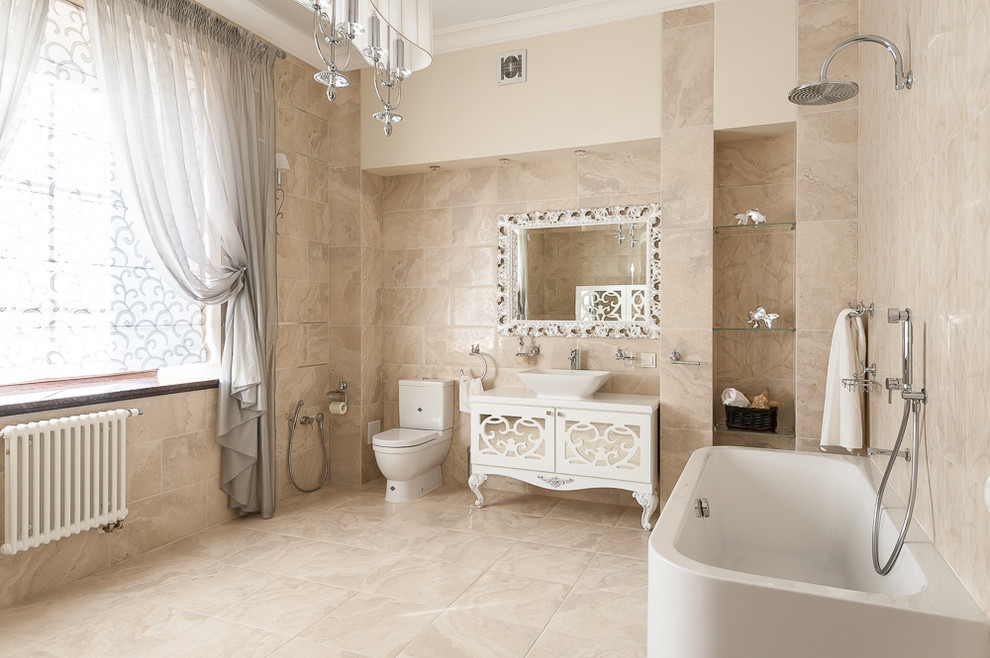 Large elegant master beige tile and porcelain tile beige floor and porcelain tile bathroom photo in Other with a vessel sink, white countertops and white cabinets