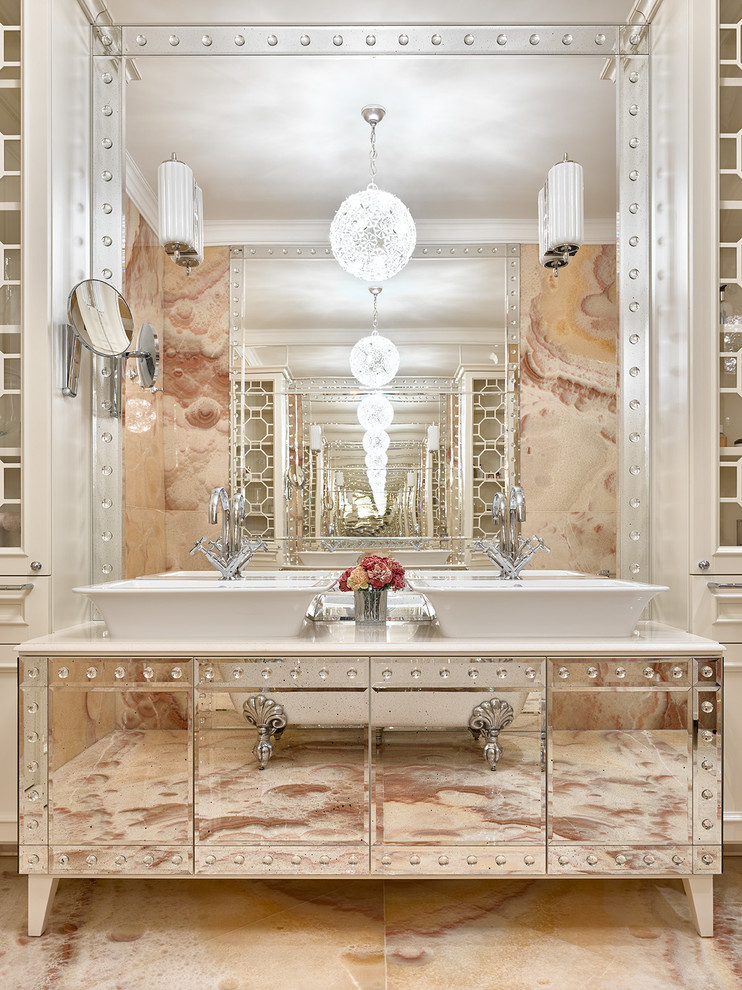 На фото: ванная комната в стиле неоклассика (современная классика) с плоскими фасадами, бежевой плиткой, настольной раковиной, бежевым полом и белой столешницей