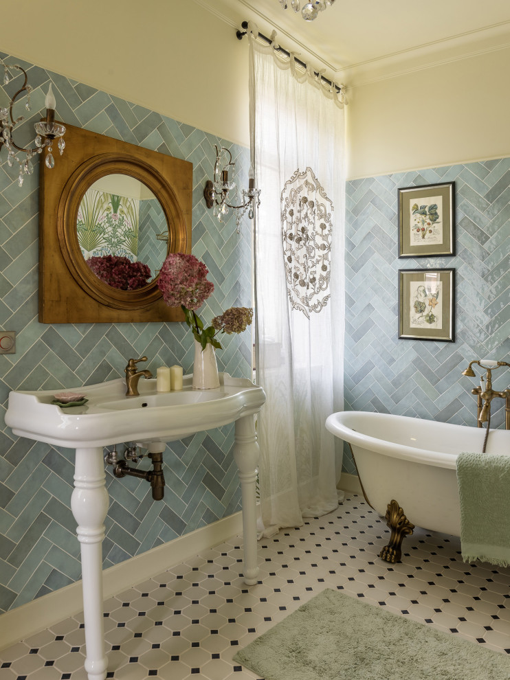 Elegant gray tile gray floor and single-sink claw-foot bathtub photo in Other with beige walls and a console sink