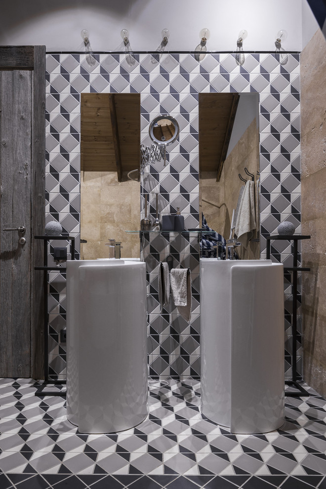 На фото: ванная комната в стиле лофт с серой плиткой, монолитной раковиной и серым полом