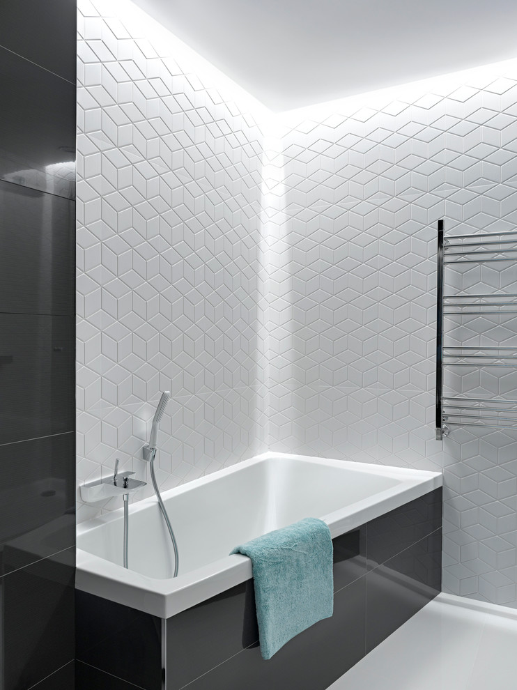 Ejemplo de cuarto de baño contemporáneo con paredes blancas