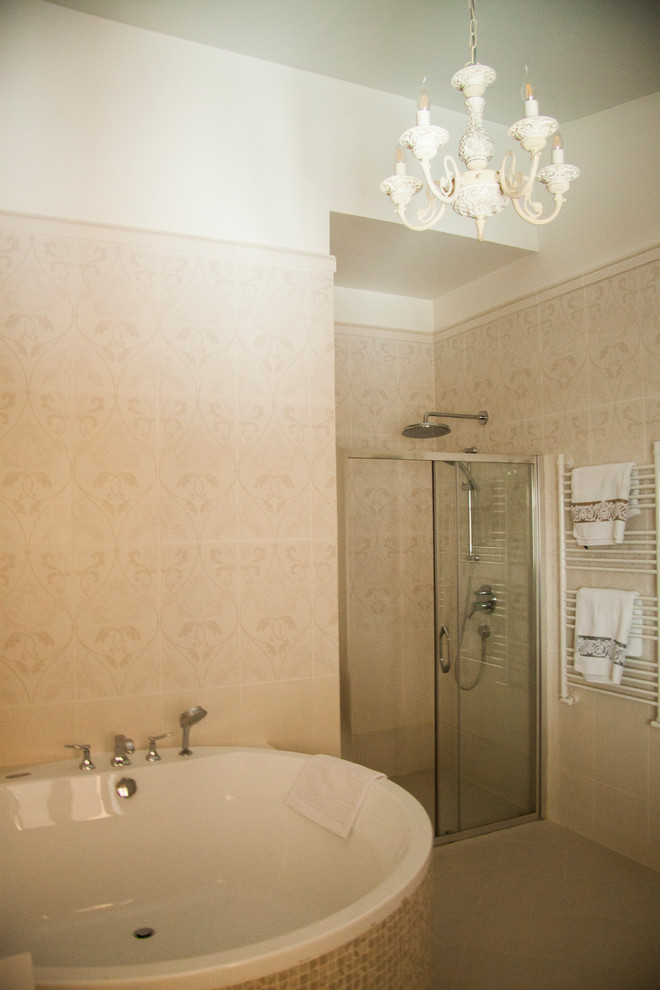 Design ideas for a large traditional ensuite bathroom in Moscow with raised-panel cabinets, beige cabinets, a submerged bath, an alcove shower, beige tiles, ceramic tiles, beige walls, porcelain flooring, an integrated sink, solid surface worktops, beige floors, a sliding door and beige worktops.
