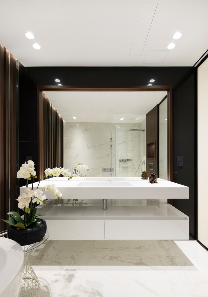 Idée de décoration pour une salle de bain design avec un lavabo intégré.