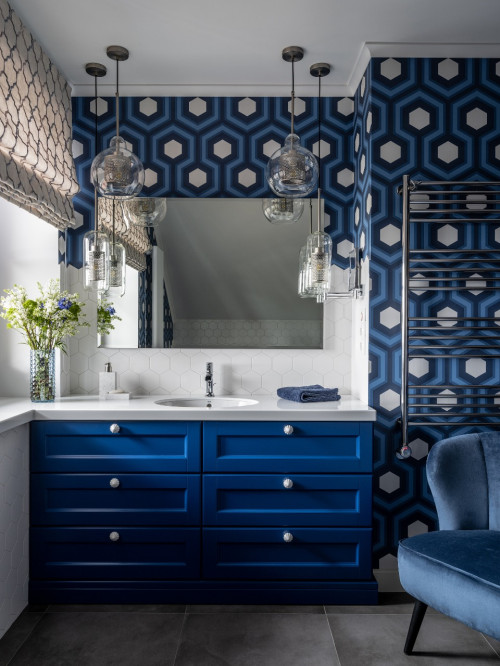 Blue Backsplash Beauty: Blue Bathroom with a White Hexagon Backsplash and Glass Pendants