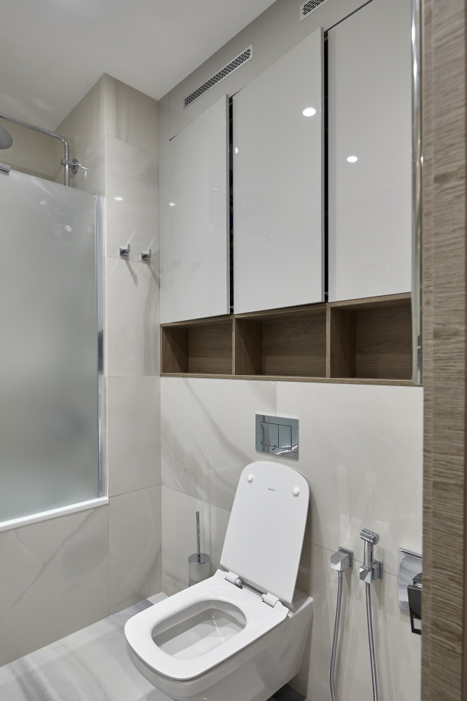 Exemple d'une petite salle d'eau tendance avec un plan de toilette blanc.