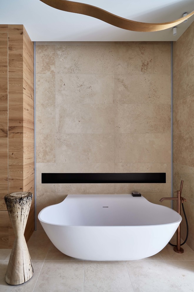 Freestanding bathtub - contemporary beige tile beige floor freestanding bathtub idea in Moscow