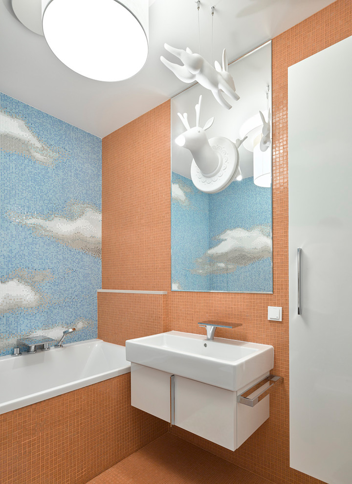 Foto de cuarto de baño infantil contemporáneo con armarios con paneles lisos, puertas de armario blancas, bañera empotrada, baldosas y/o azulejos multicolor, baldosas y/o azulejos en mosaico, suelo con mosaicos de baldosas y lavabo integrado