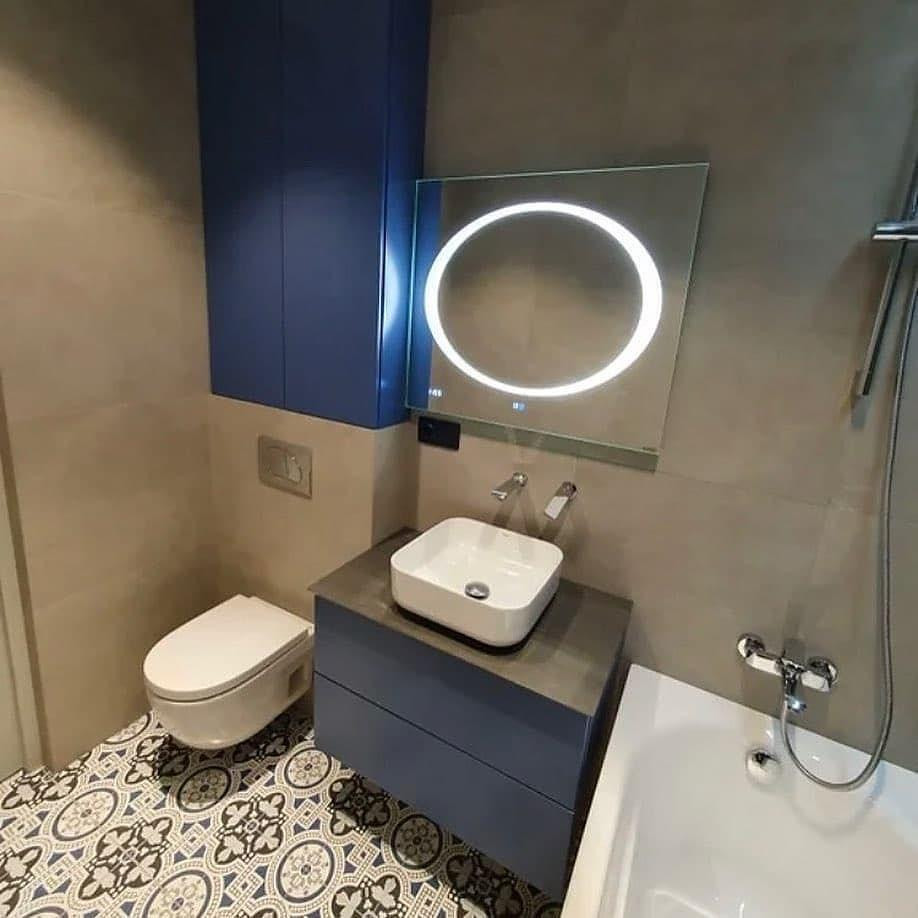 Bathroom - mid-sized contemporary master brown tile and porcelain tile ceramic tile, multicolored floor and single-sink bathroom idea in Moscow with flat-panel cabinets, blue cabinets, a wall-mount toilet, brown walls, a drop-in sink, solid surface countertops, brown countertops and a floating vanity